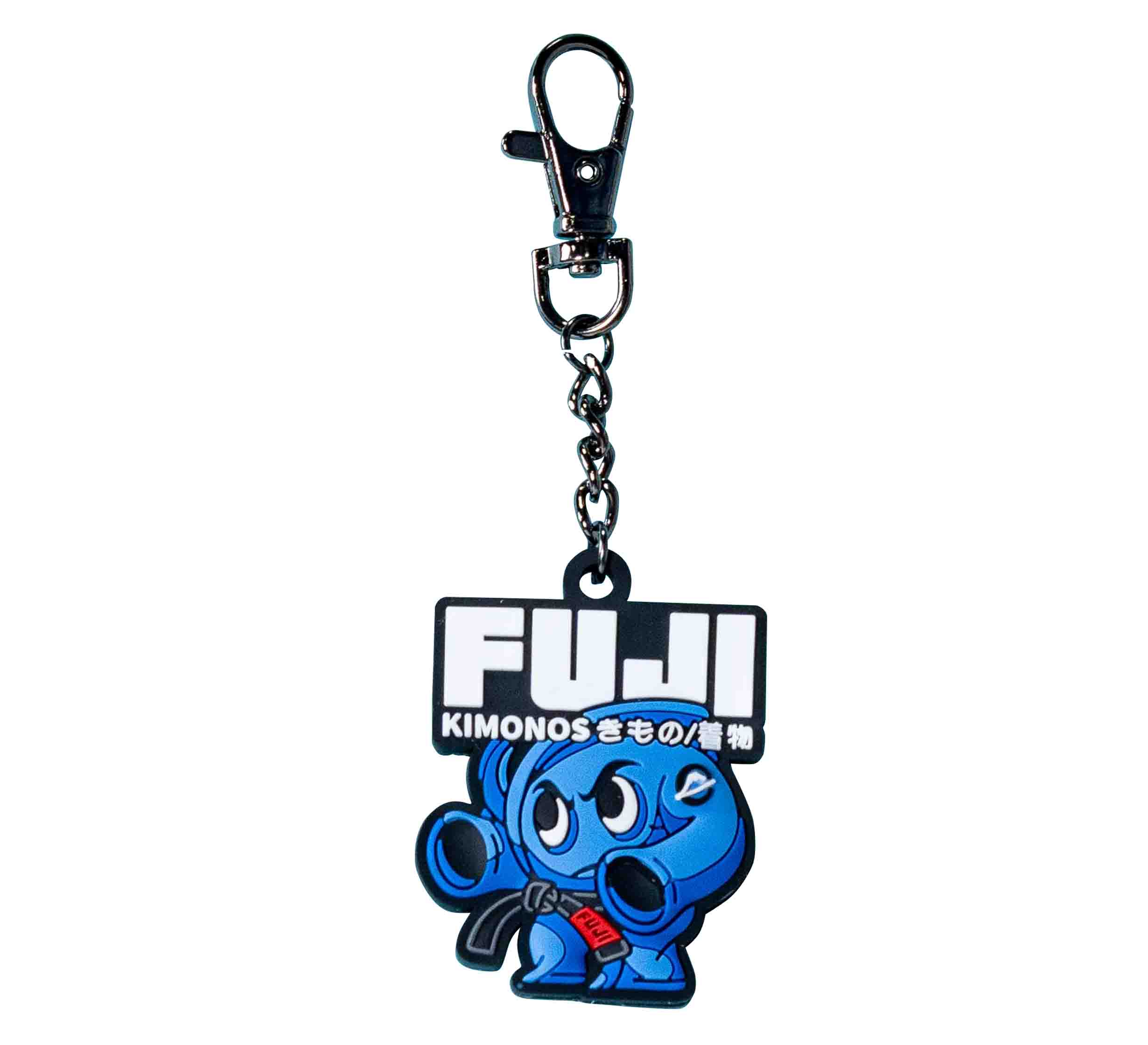 The FUJI Kimono Keychain Blue features a cute blue cartoon character in a martial arts gi with a red belt. "FUJI KIMONOS" appears above in bold letters, with Japanese text below for added style.