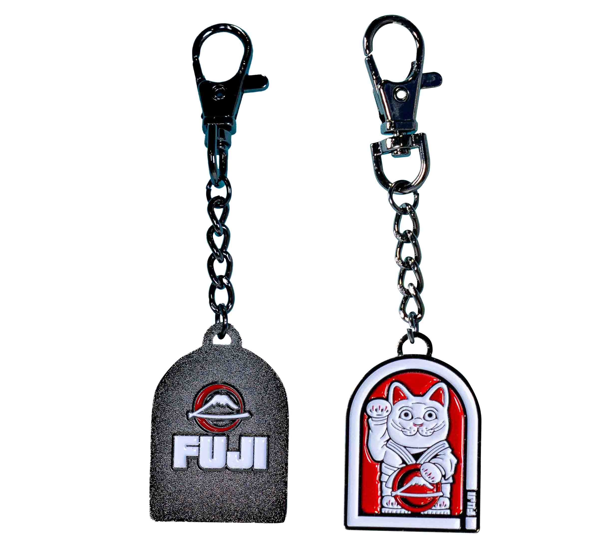 The FUJI Maneki-Neko Keychain set includes two keychains with metal clasps: one with a circular FUJI logo, the other featuring a waving lucky cat, both on rectangular backings with rounded tops.