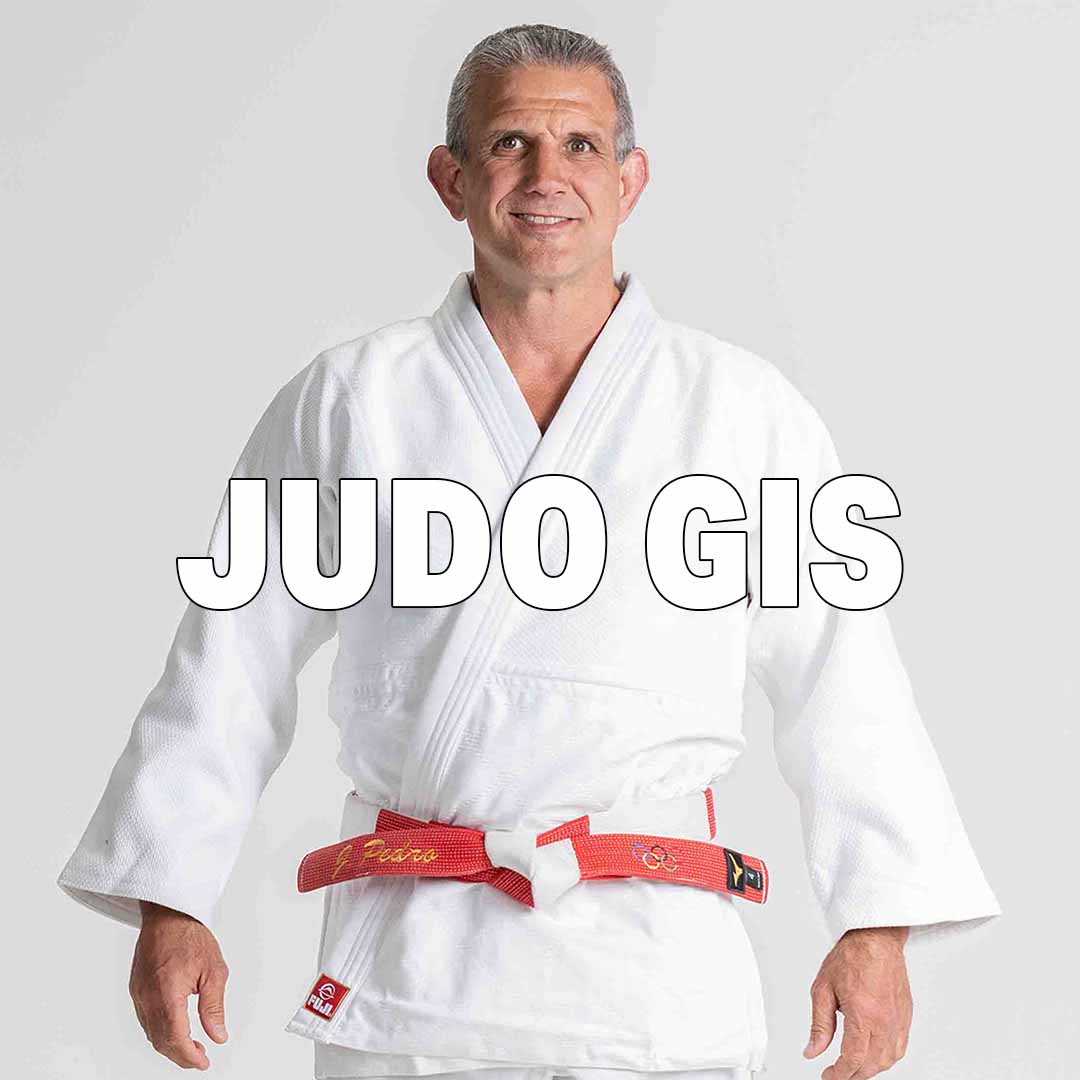 A man wearing a white judo gi and a red-and-white belt stands smiling against a plain background. The text JUDO GIS is written in large white letters across the image.