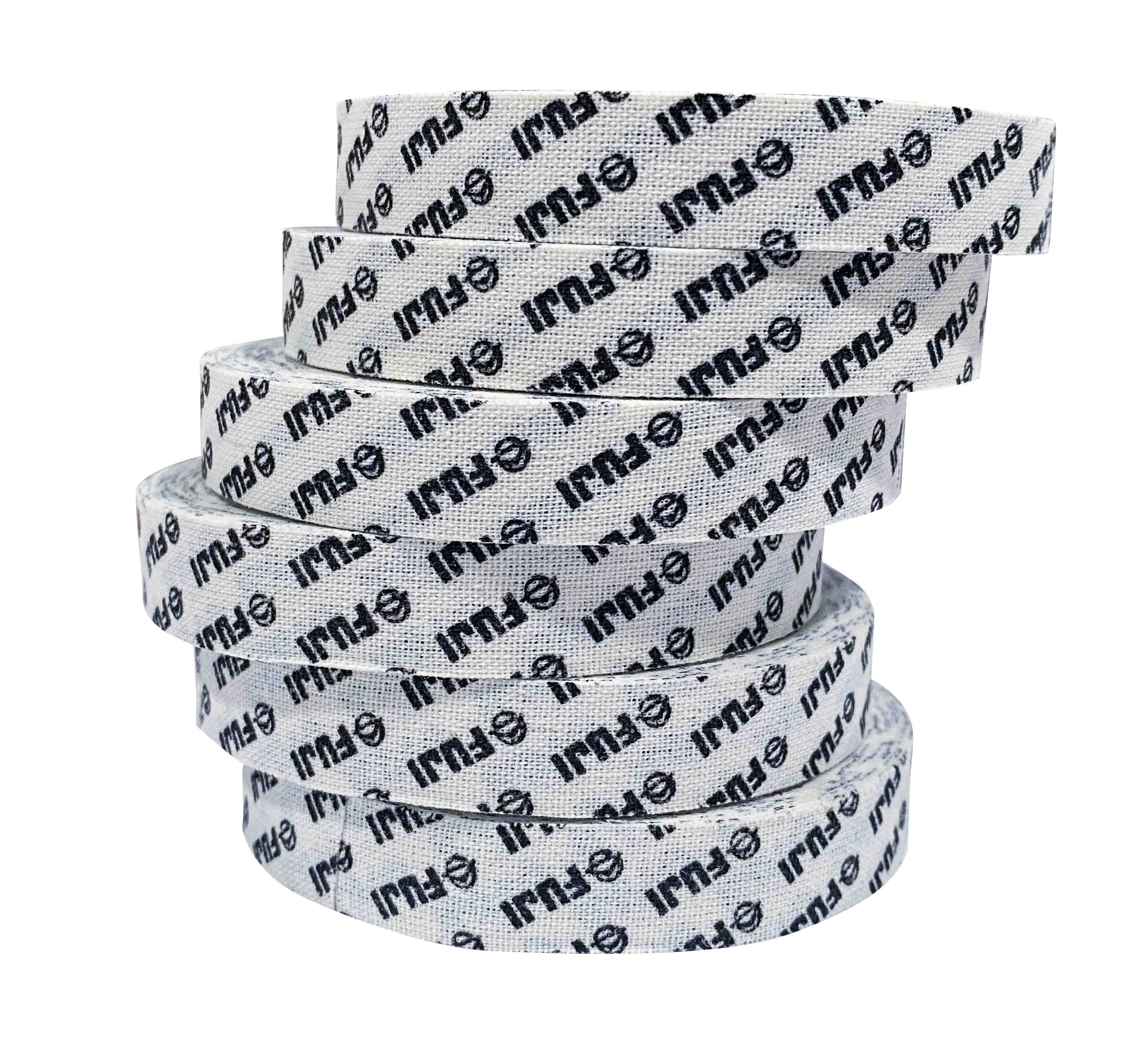 Seven rolls of Step & Repeat FUJI Finger Tape, featuring repeated black IMA logos and symbols, are stacked in a staggered spiral against a white background.