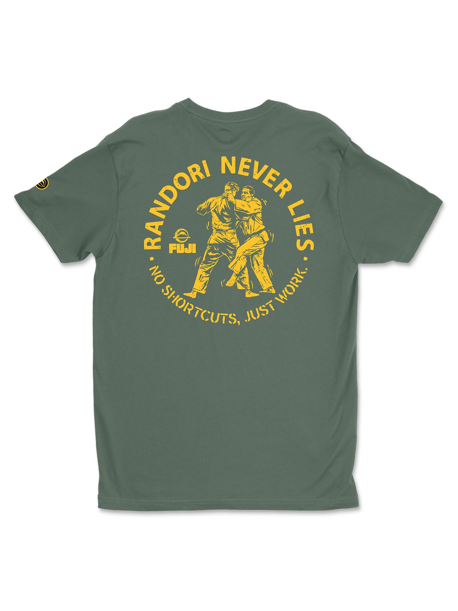 Randori Never Lies Vintage Shirt Green features a yellow graphic of two people practicing judo on a green T-shirt. The design includes the text “RANDORI NEVER LIES” above, with “NO SHORTCUTS, JUST WORK!” and the FUJI logo below.