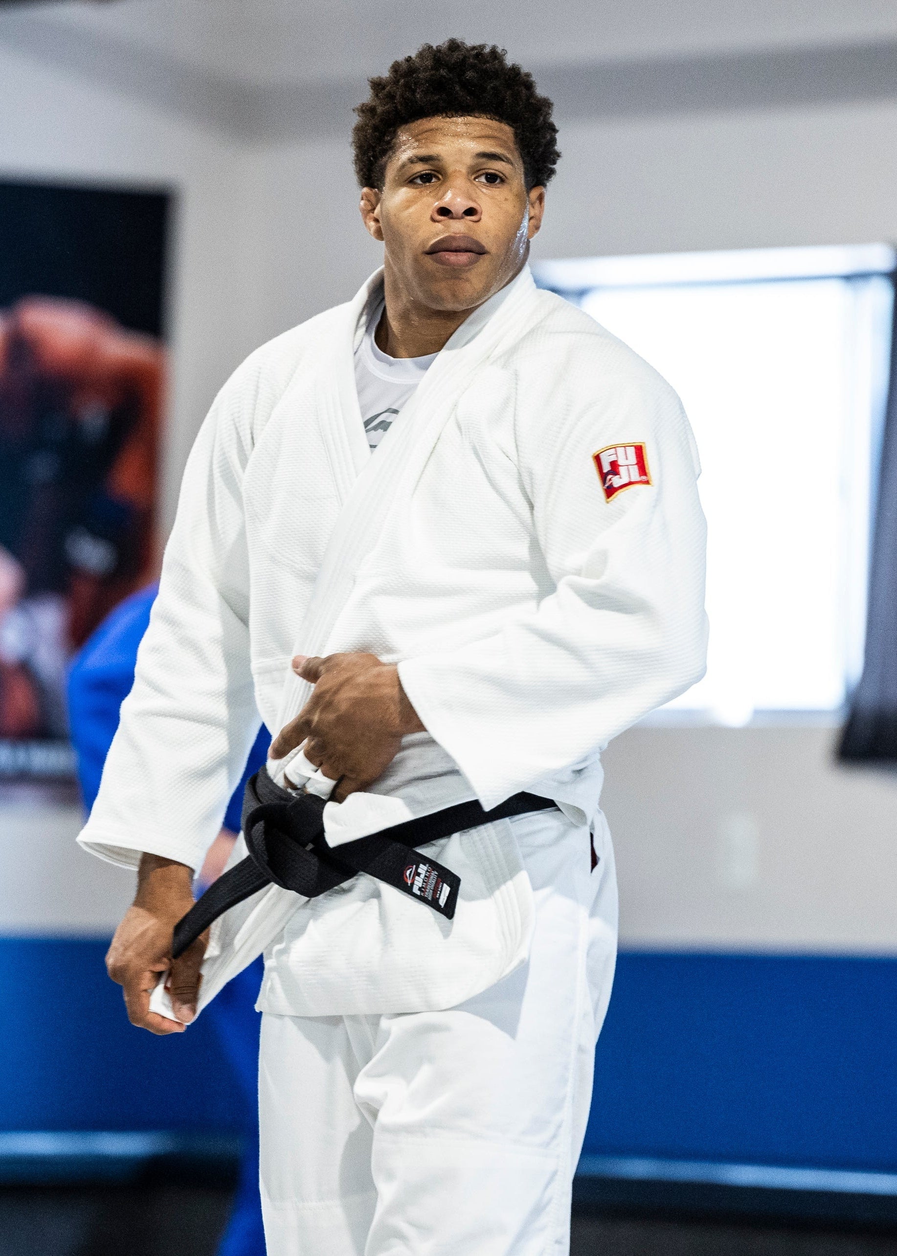 Judo athlete wearing a white judo gi
